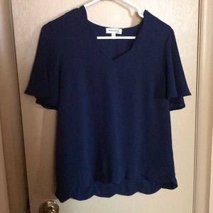 Scalloped navy blue blouse
